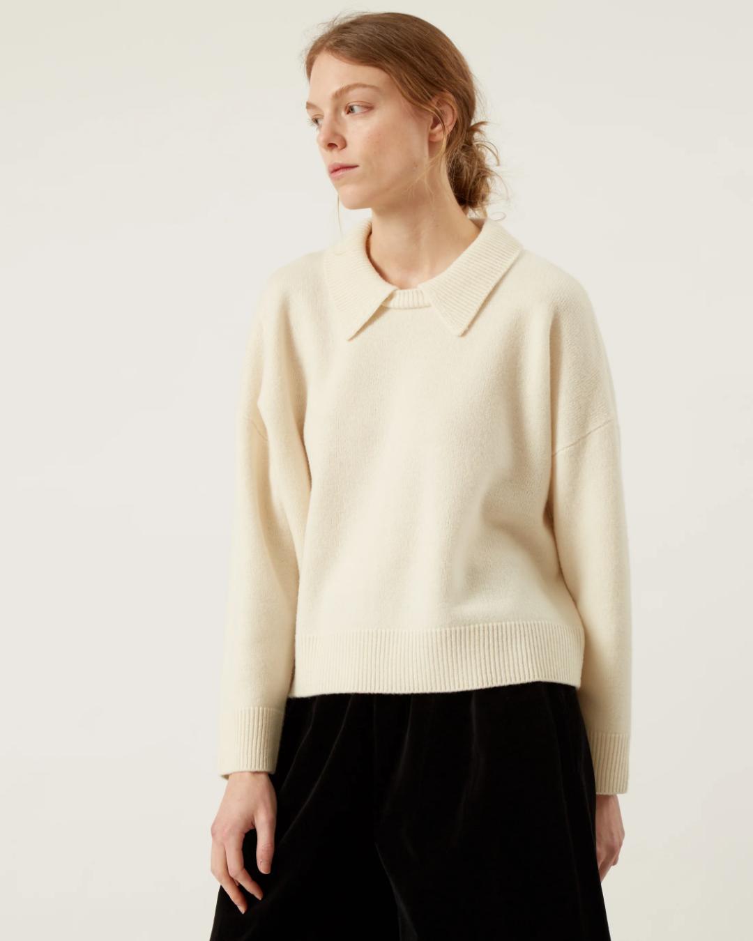 cream sweater with a collar
