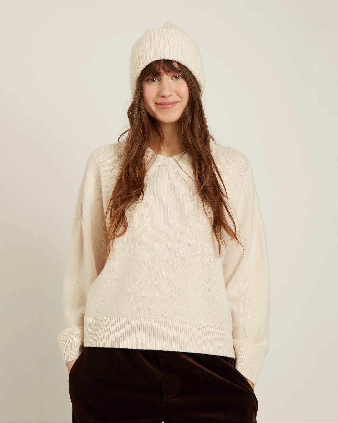 cream sweater with a collar