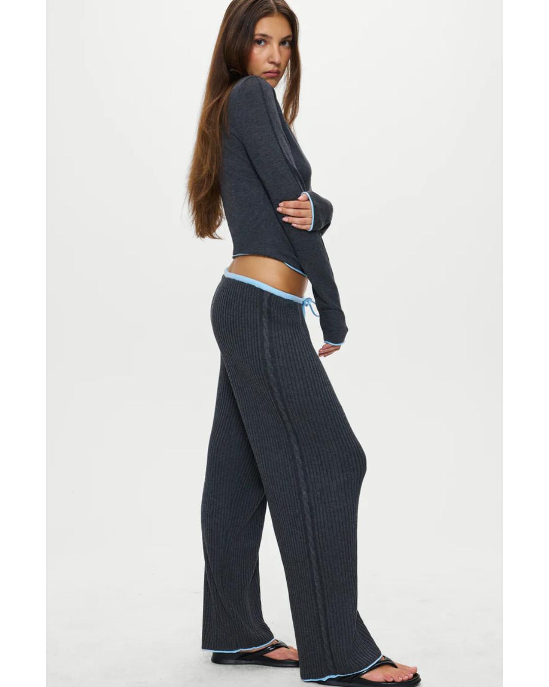 grey button up cardigan with blue details on the top and bottom