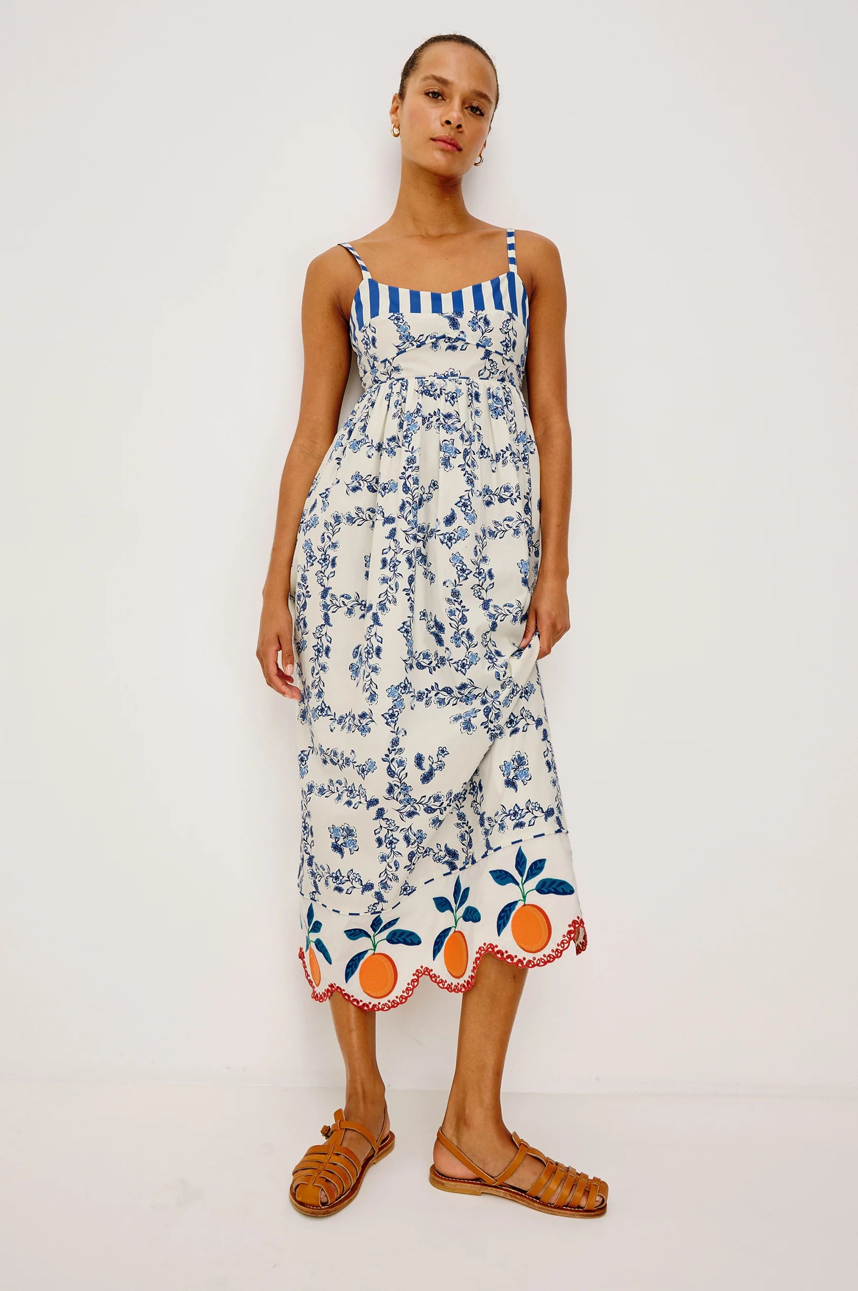 blue floral maxi dress with oranges on bottom