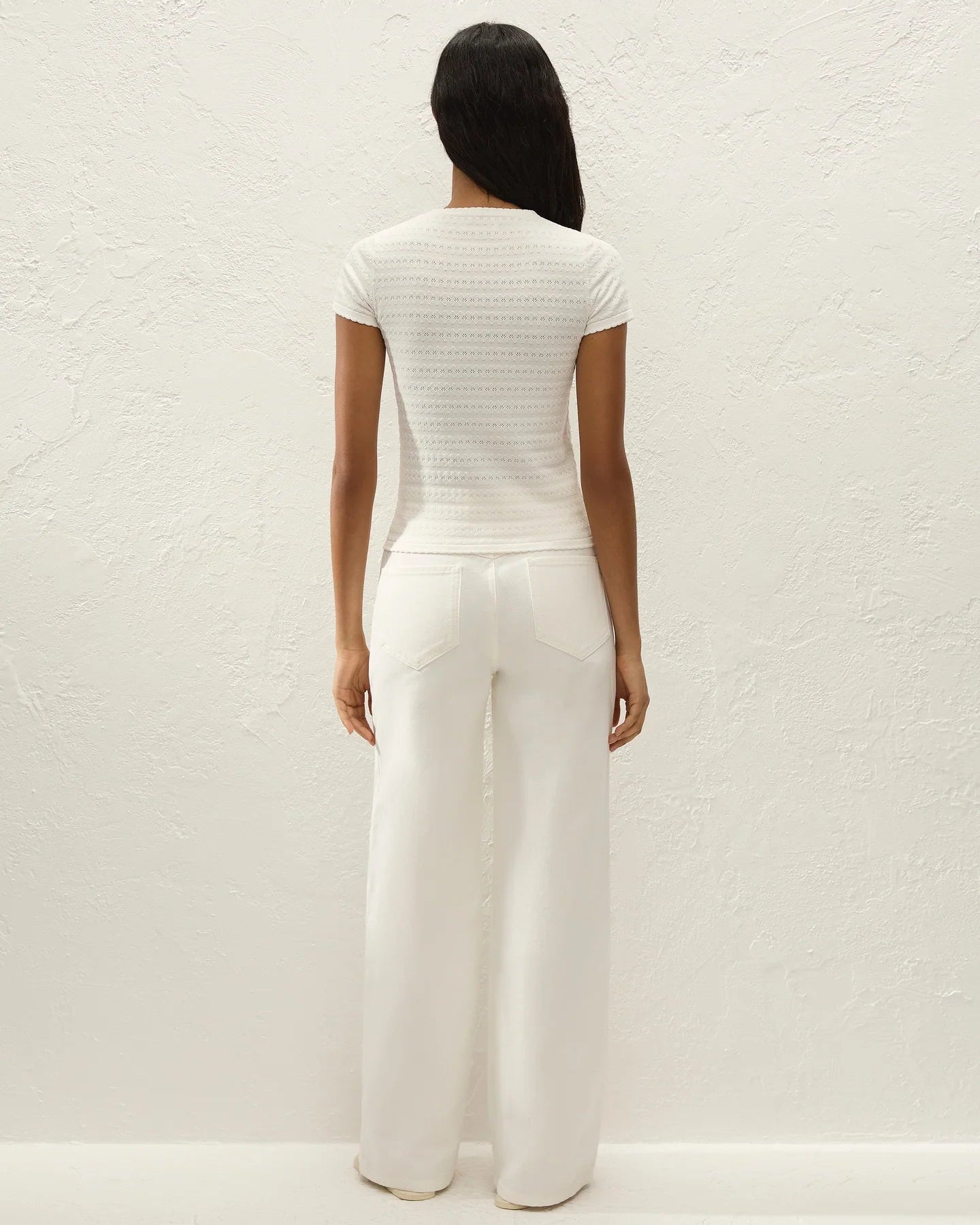 white short sleeve top with a pointelle print