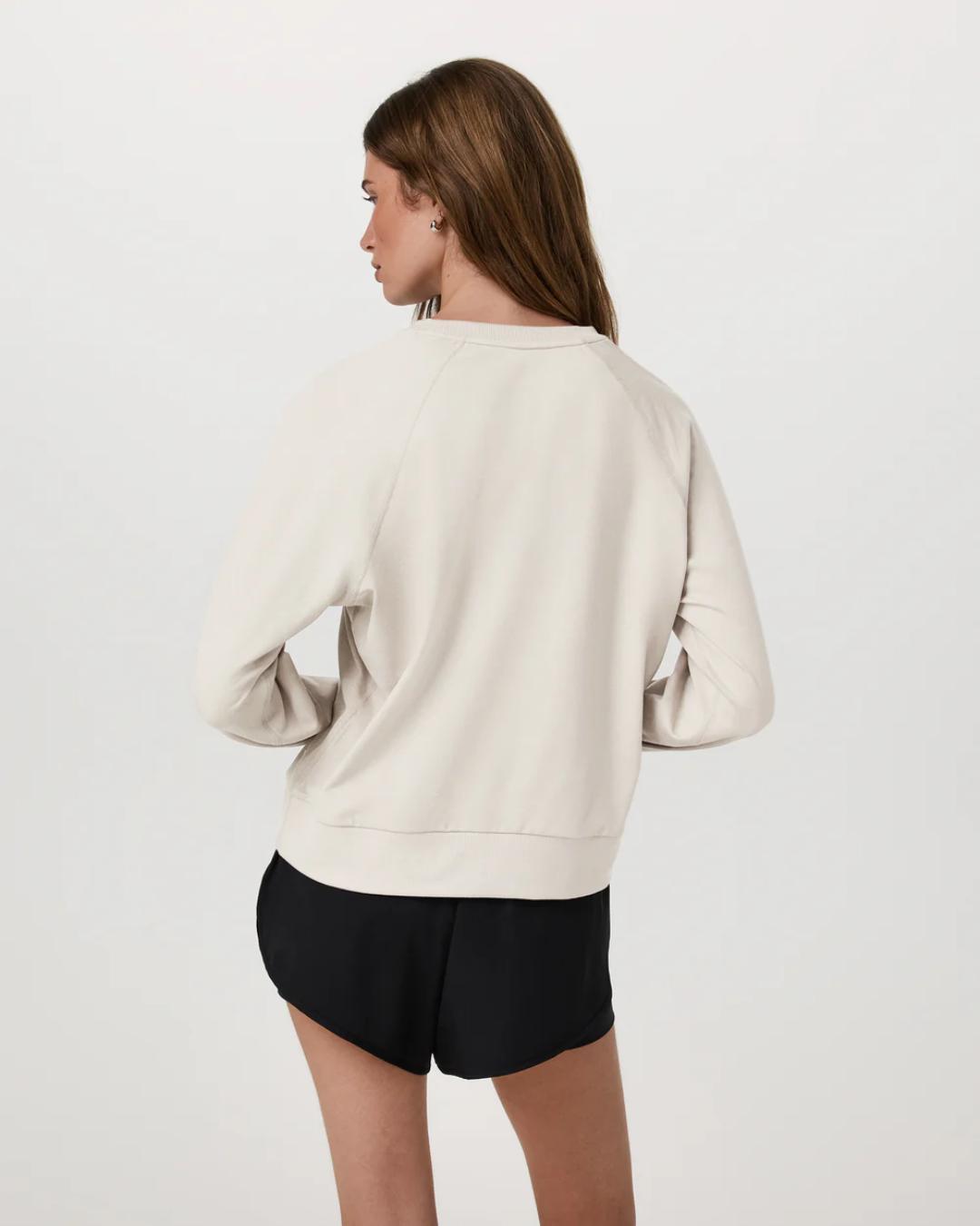beige crewneck sweatshirt