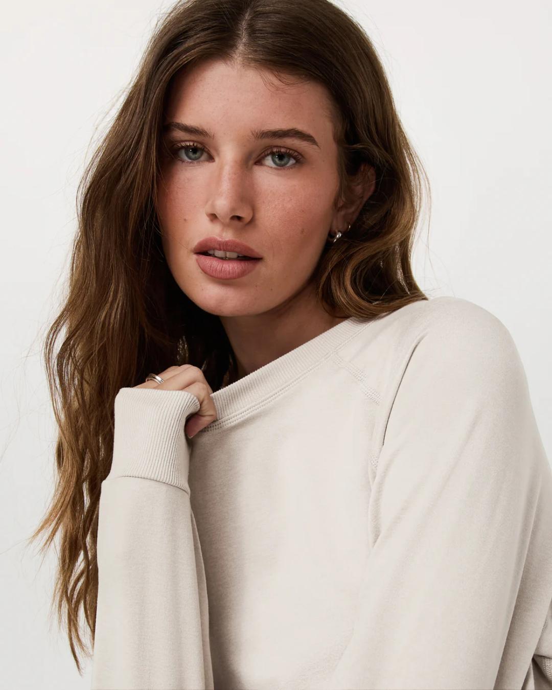 beige crewneck sweatshirt