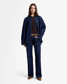 dark blue denim jeans with a straight leg