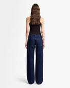 dark blue denim jeans with a straight leg