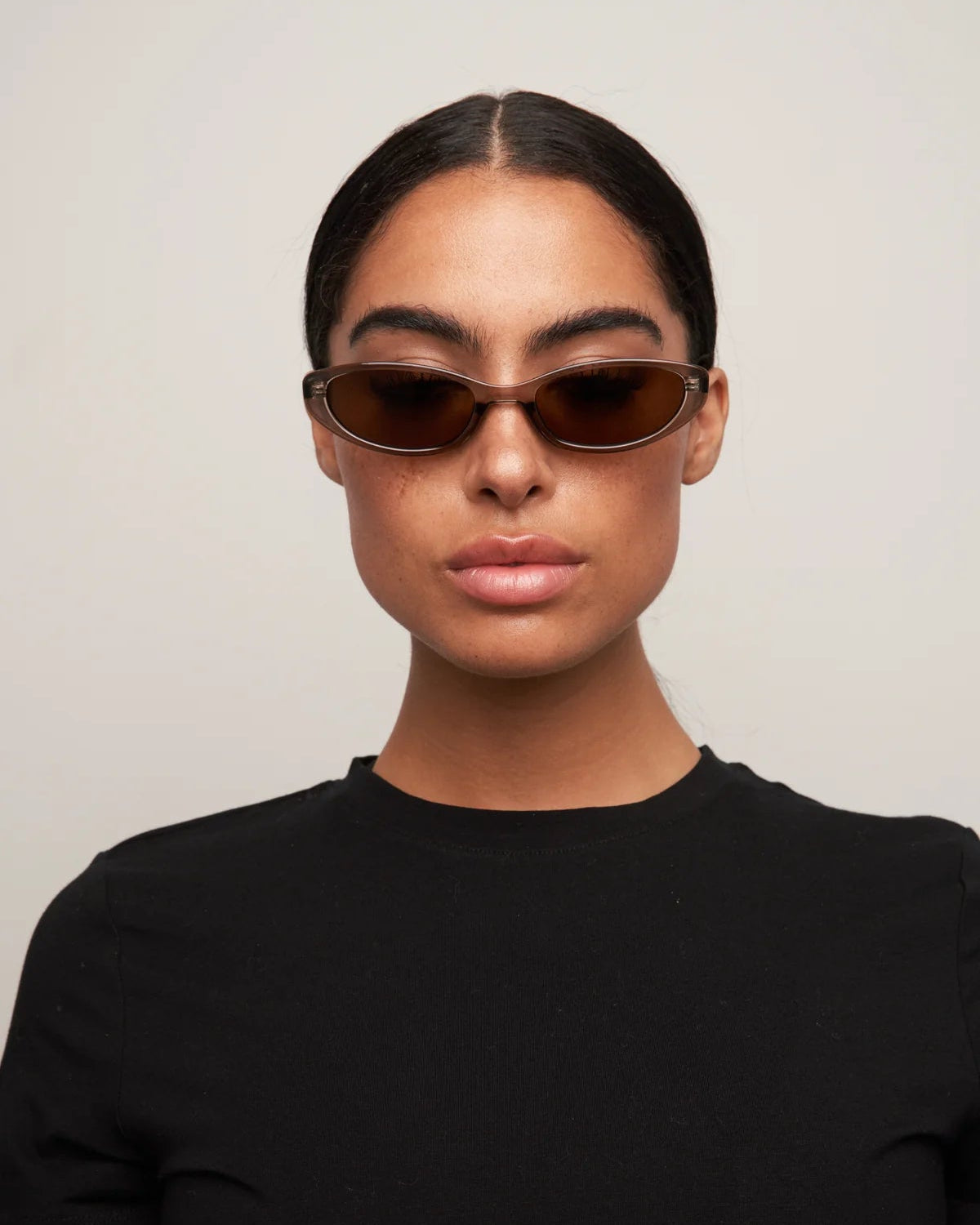 cat eye sunglasses with a brown transparent frame