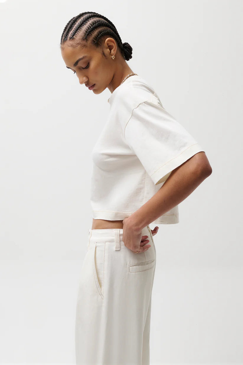 off white crop top with slit in the back