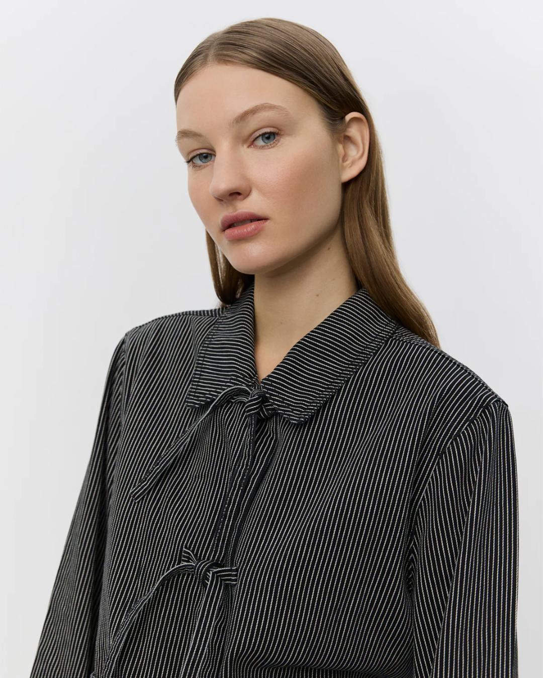 black striped jacket that ties in the front