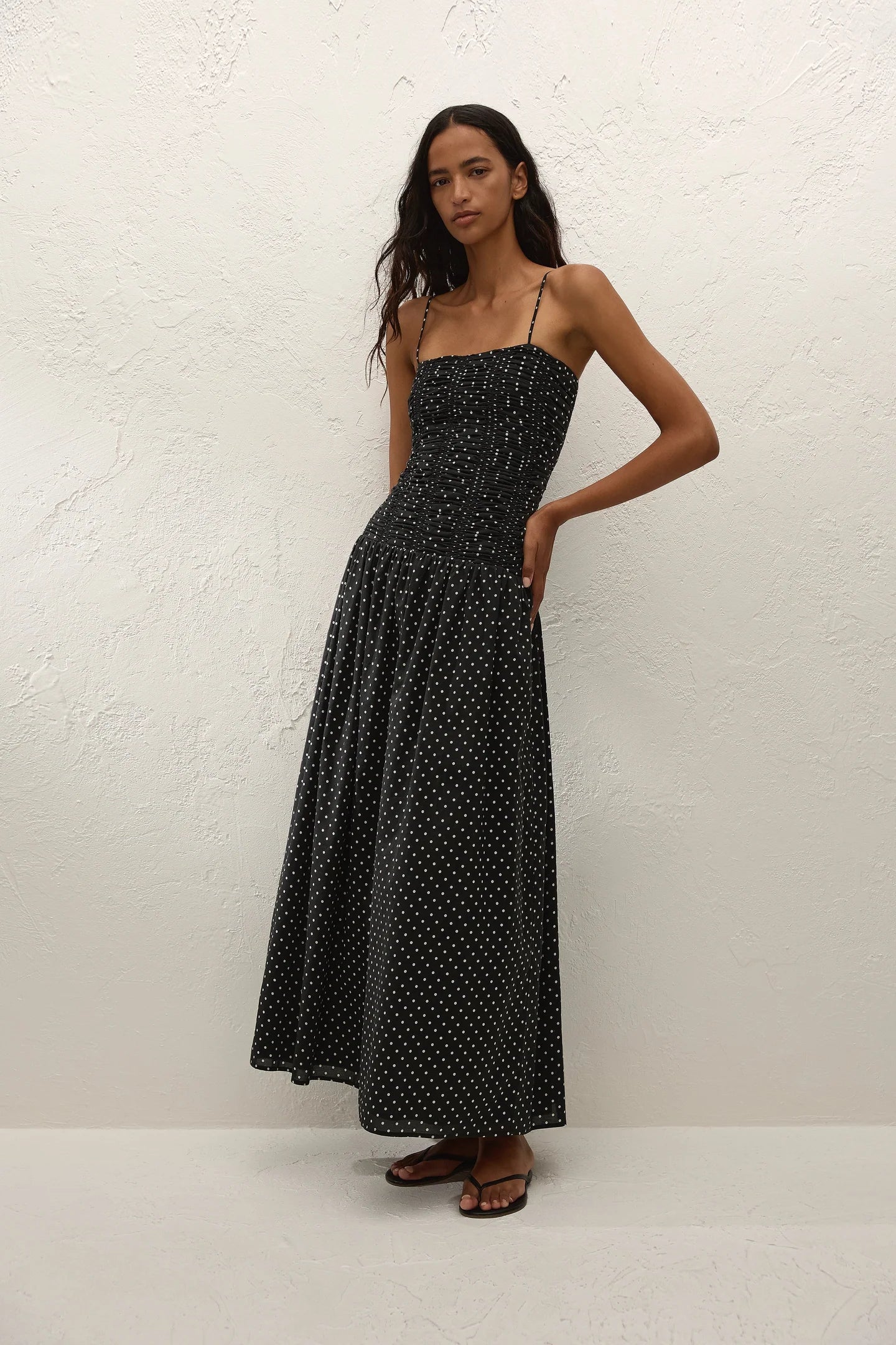 black maxi dress with cream polka dots