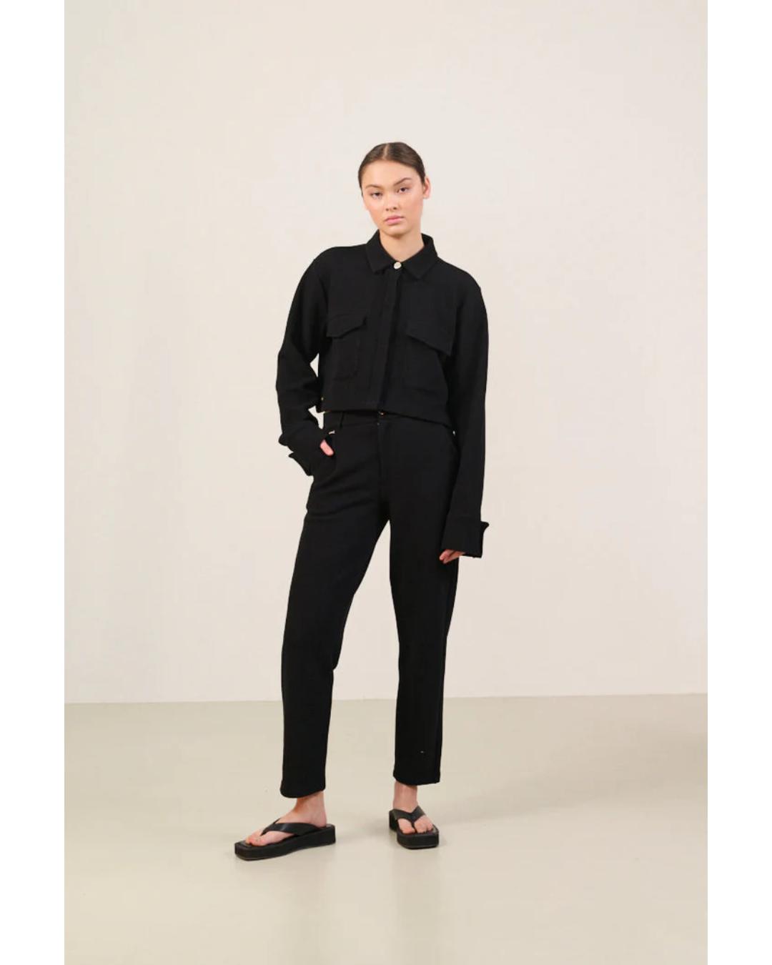 cropped black jacket with collar and pockets on chest