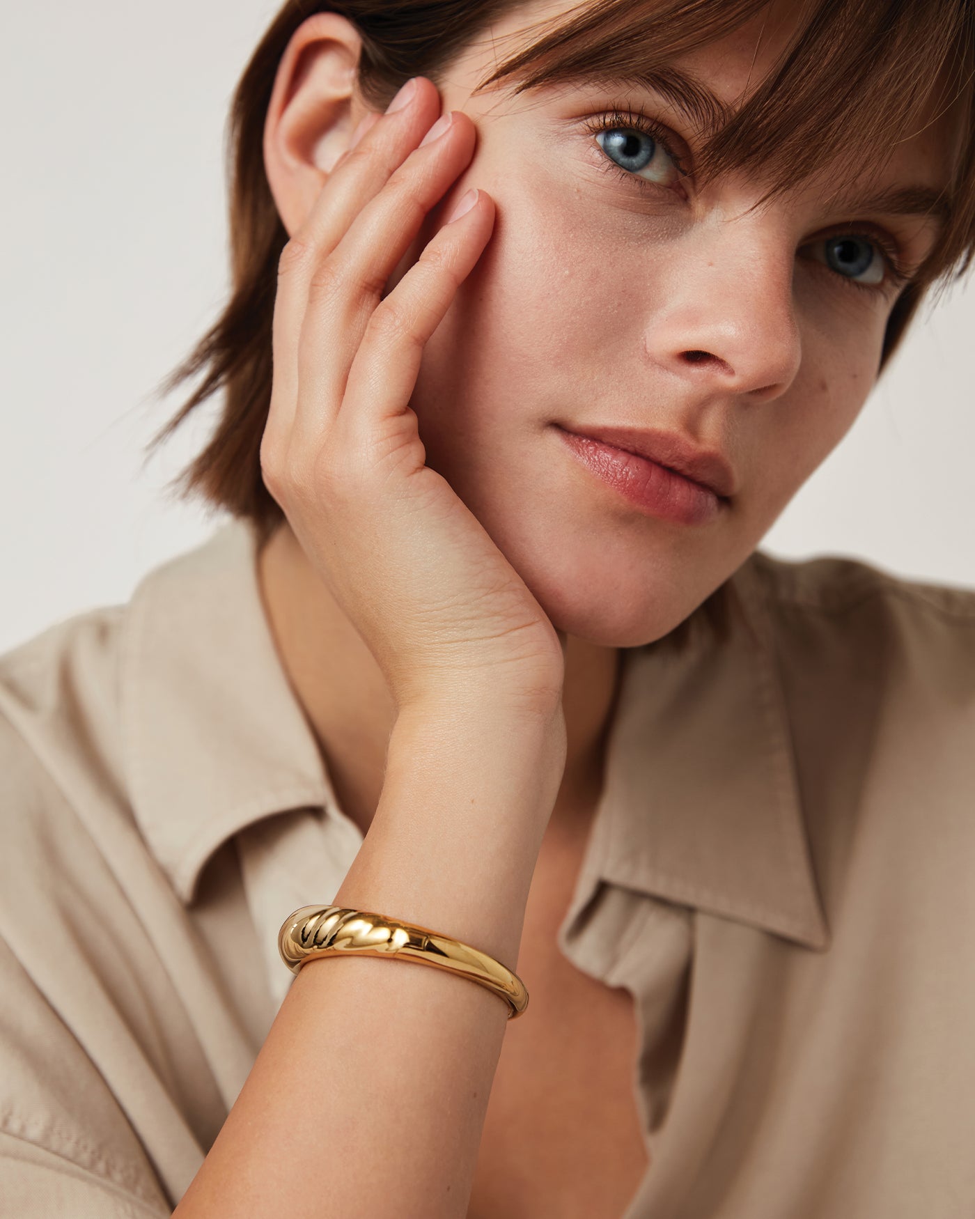 statment gold bangle