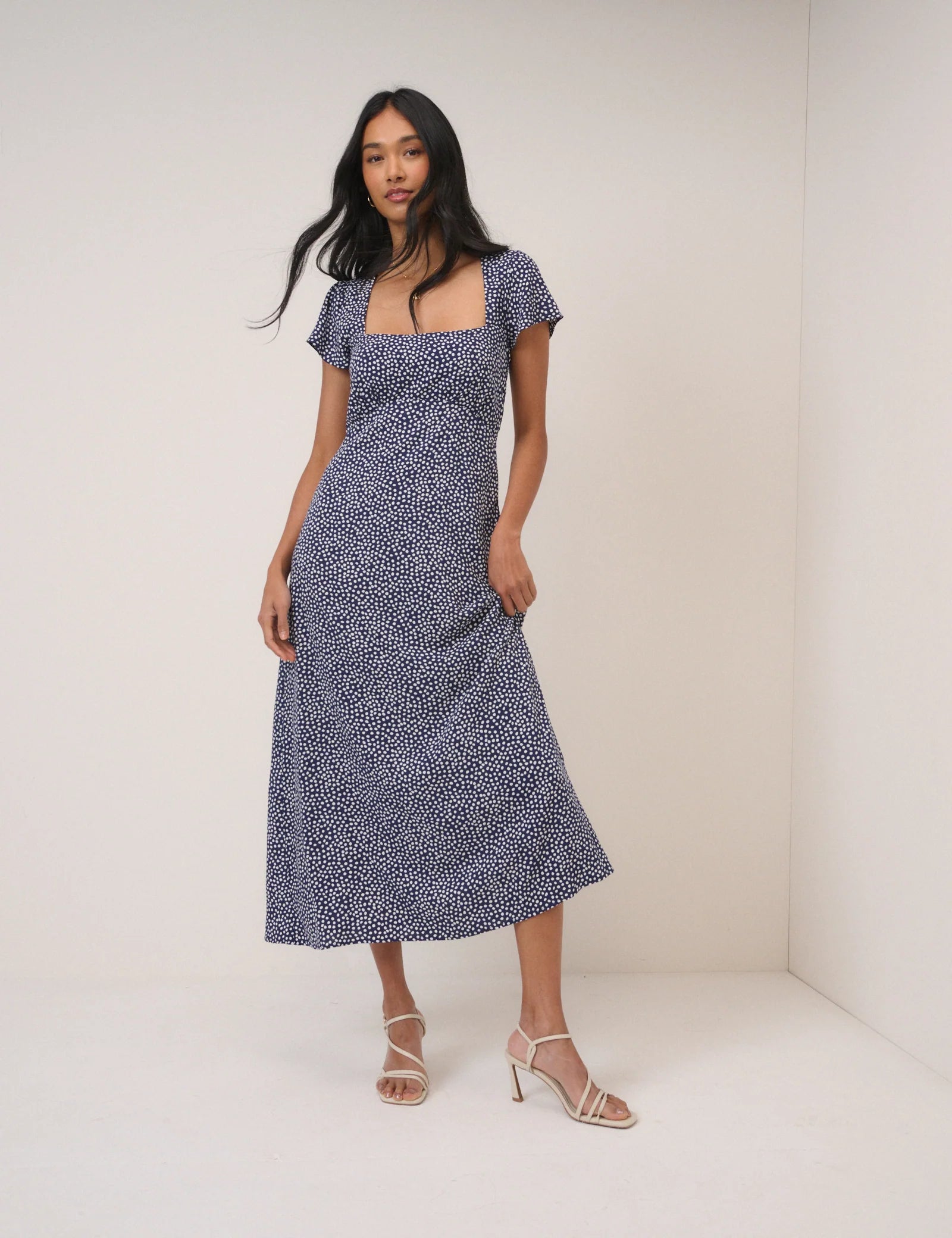 blue midi dress in blue with small white polka dots