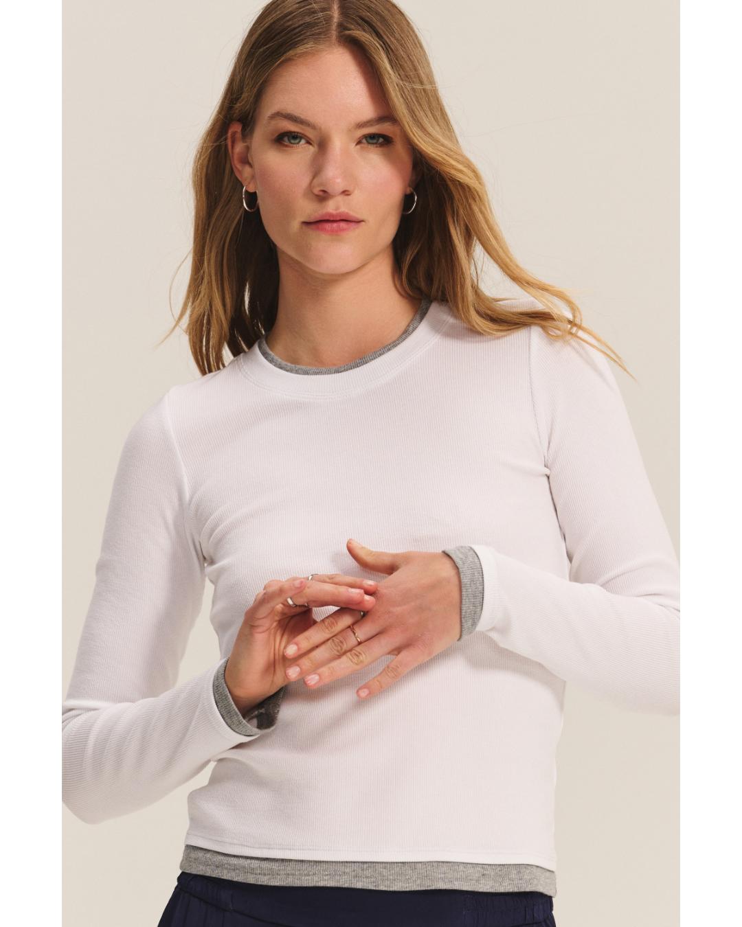 long sleeve shirt in white with grey on bottom and sleeves