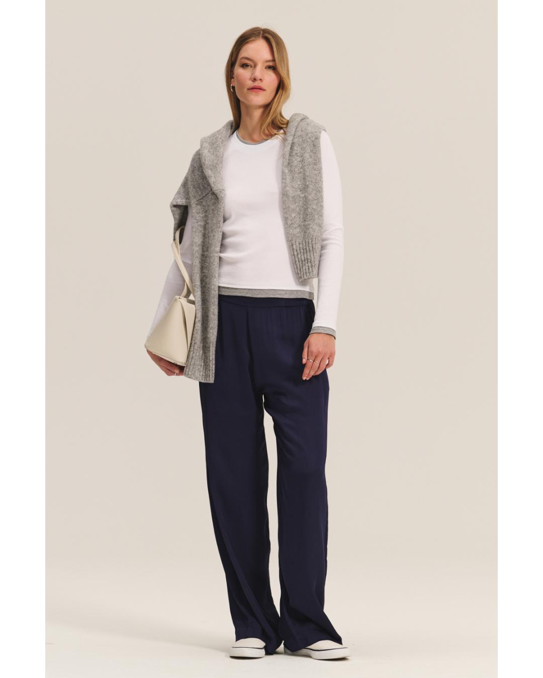 long sleeve shirt in white with grey on bottom and sleeves