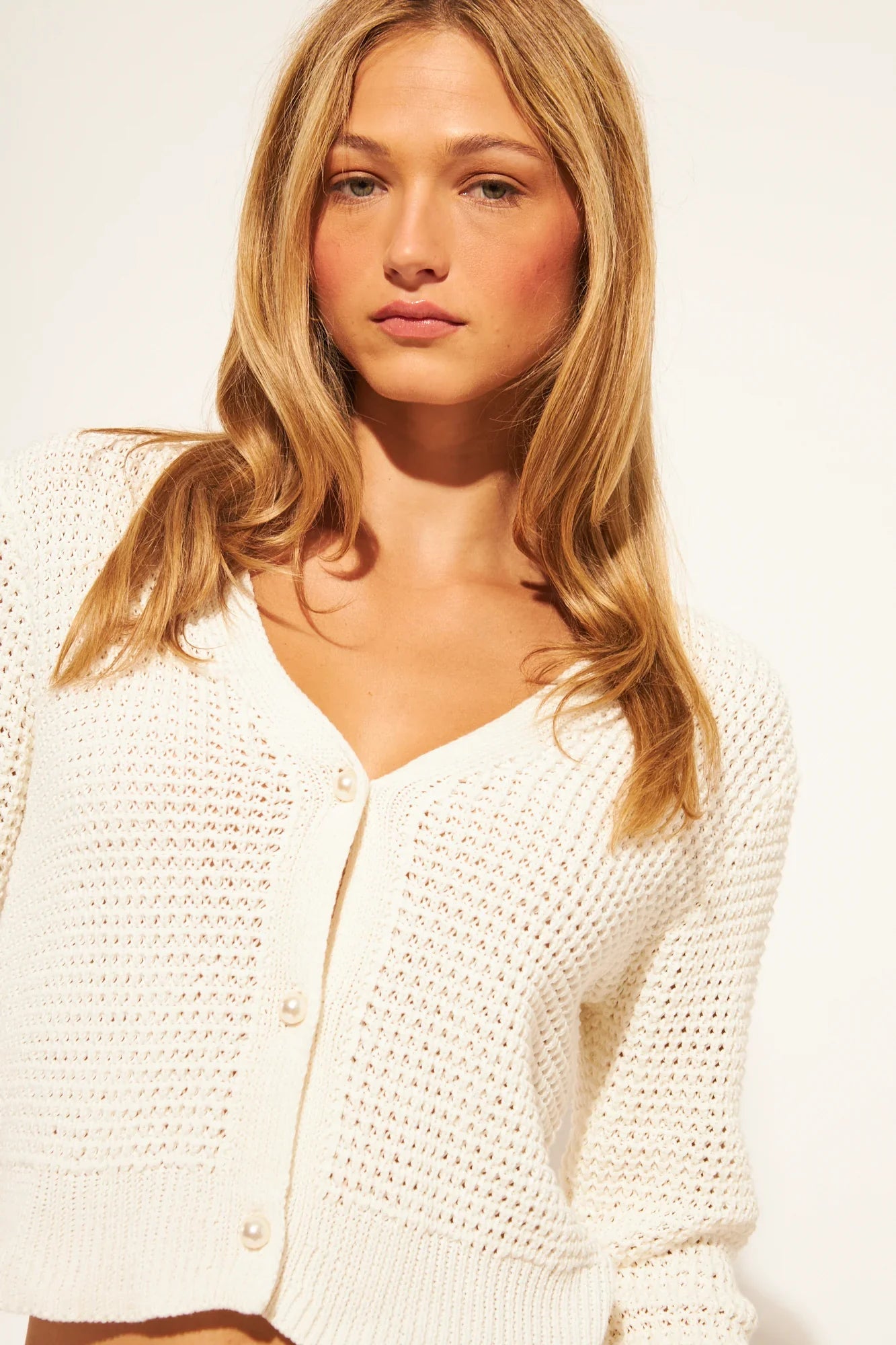knit cardigan in white with pearl buttons