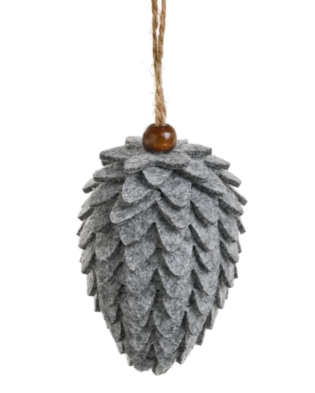 grey felt ornament in a pinecone shape