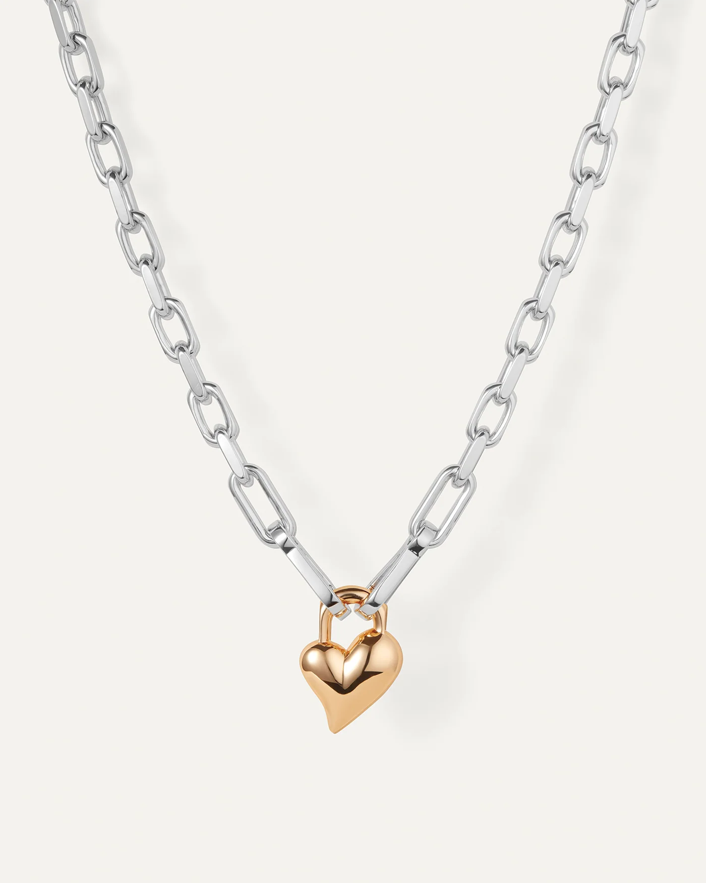 two tone statement link necklace with heart pendant