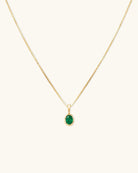 emerald necklace on a gold chain