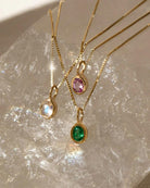 emerald necklace on a gold chain