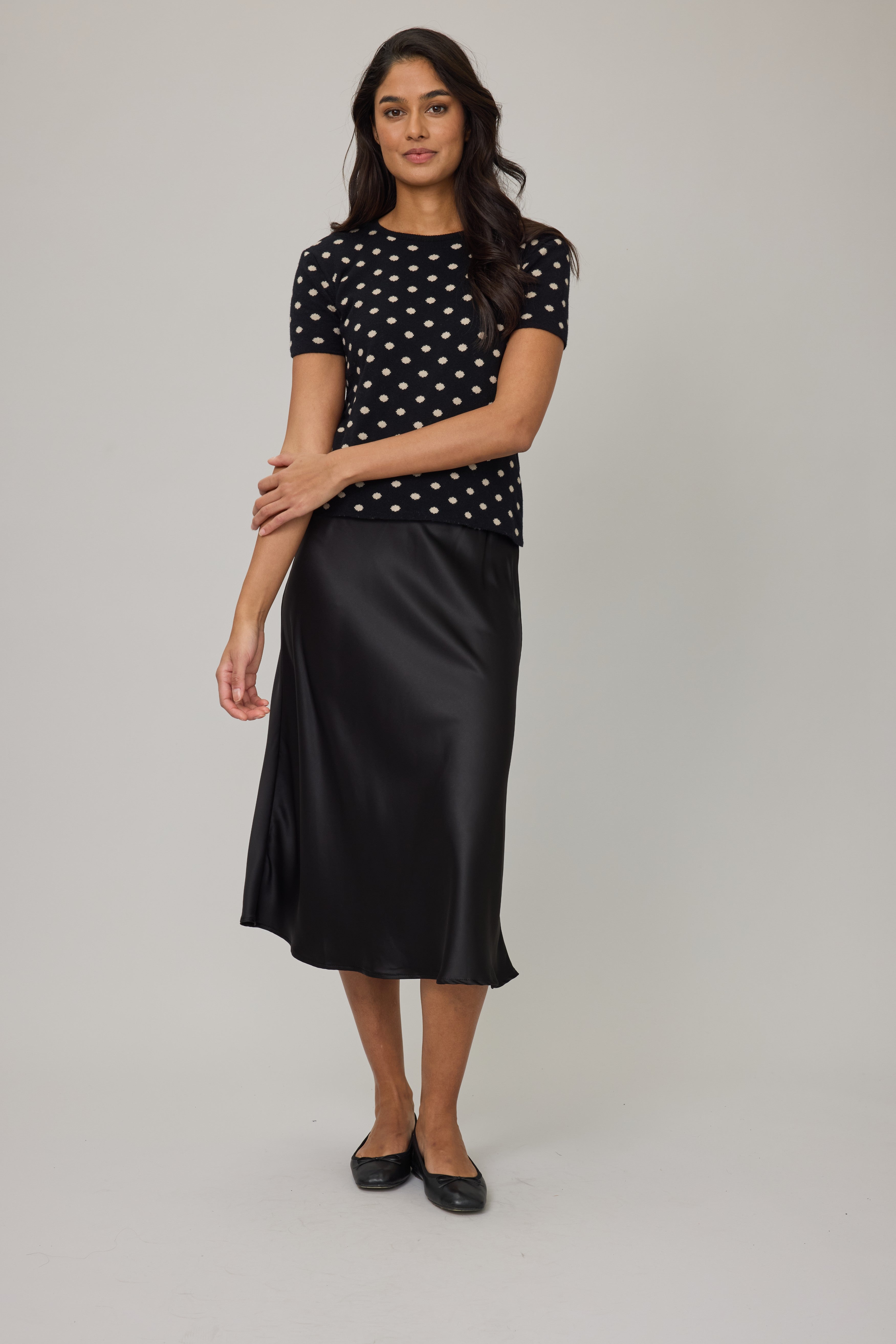 short sleeve black sweater with cream polka dots