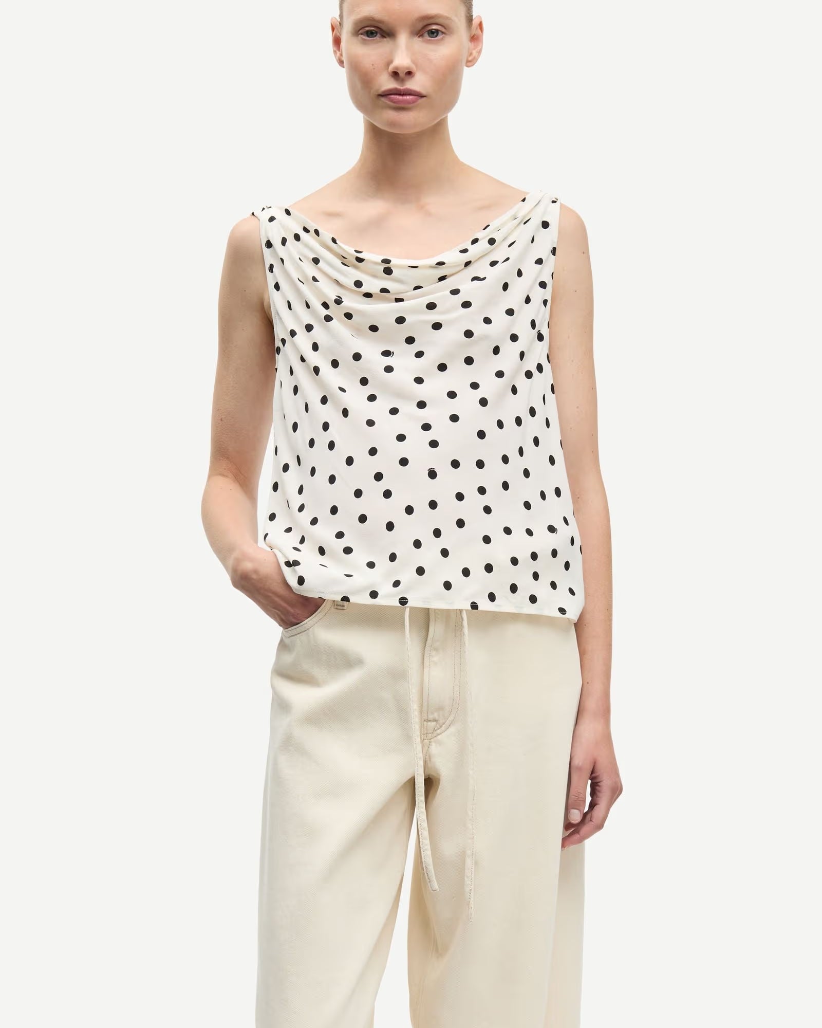 cream tank with black polka dots