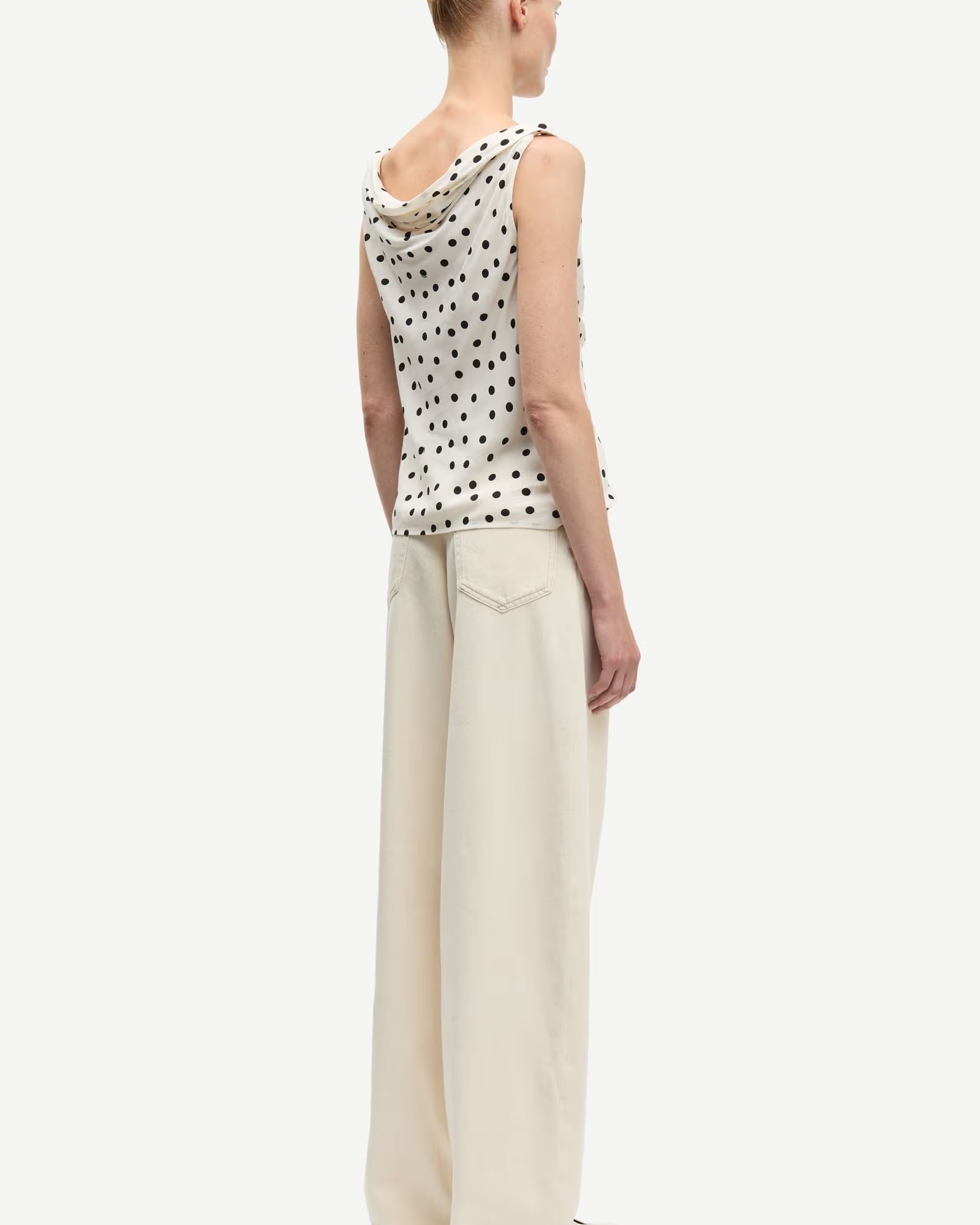 cream tank with black polka dots