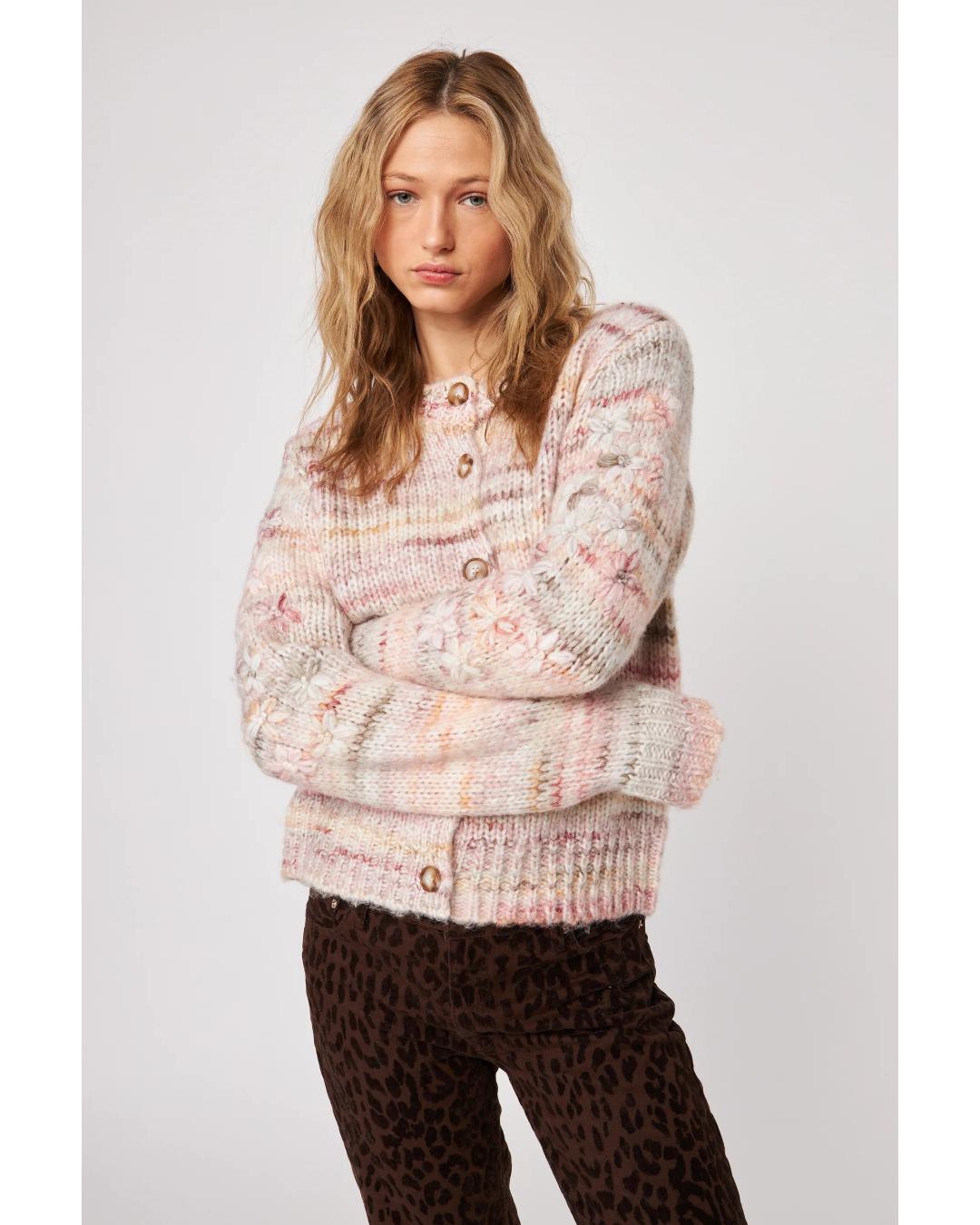 knit cardigan in with some pink, orange, red and brown in it