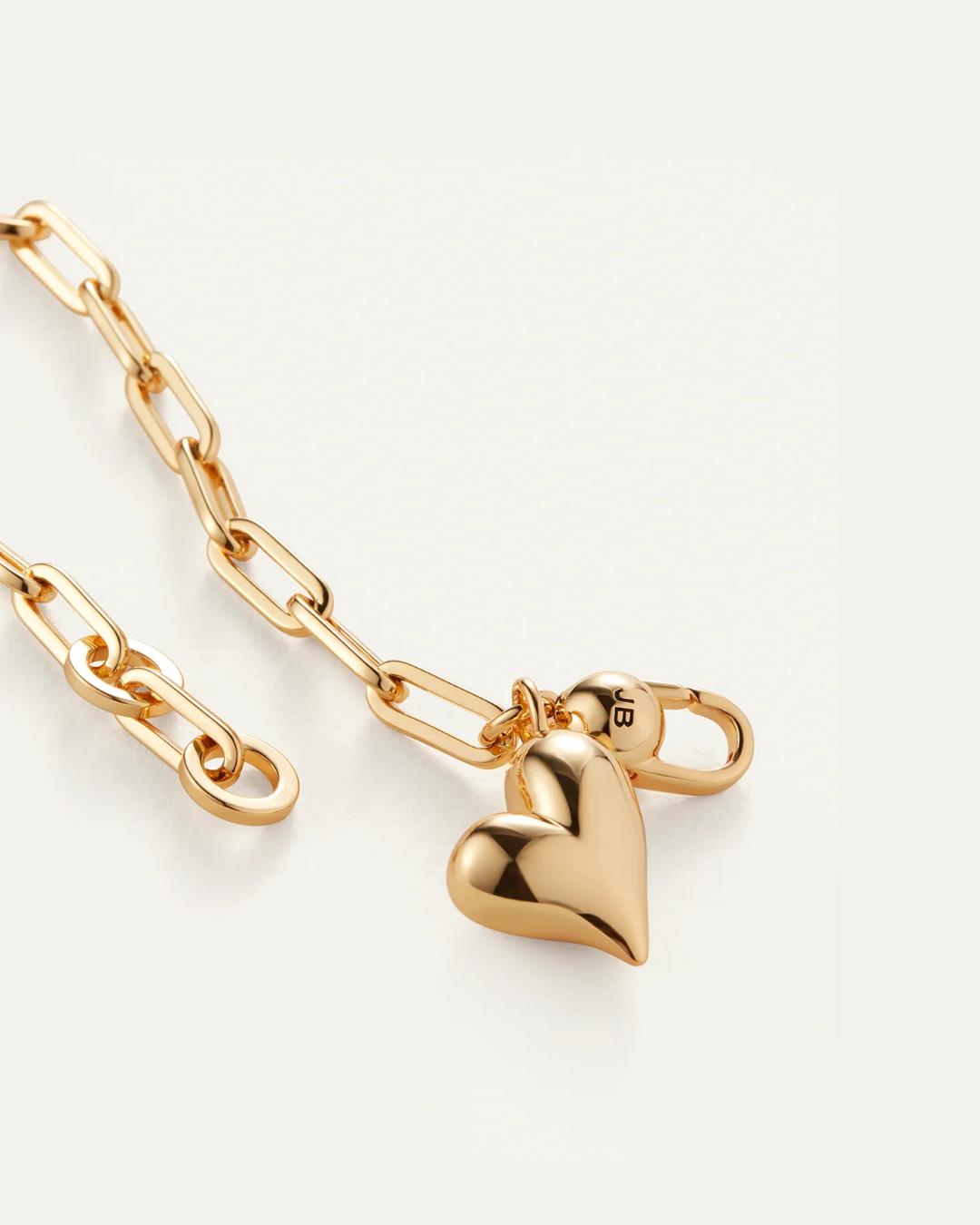 jenny bird link bracelet with heart pendant in gold