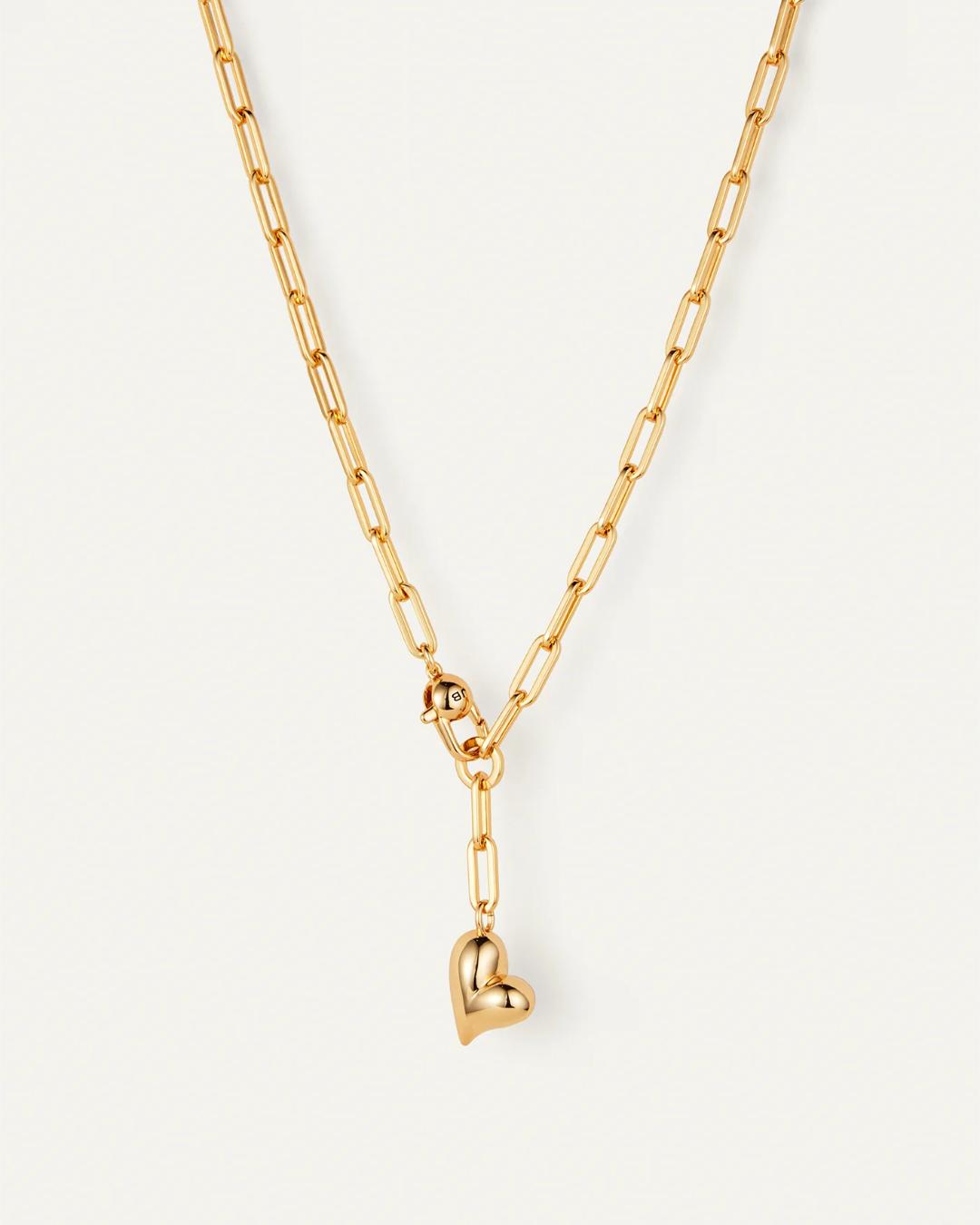 jenny bird statement link necklace with a heart pendant in gold