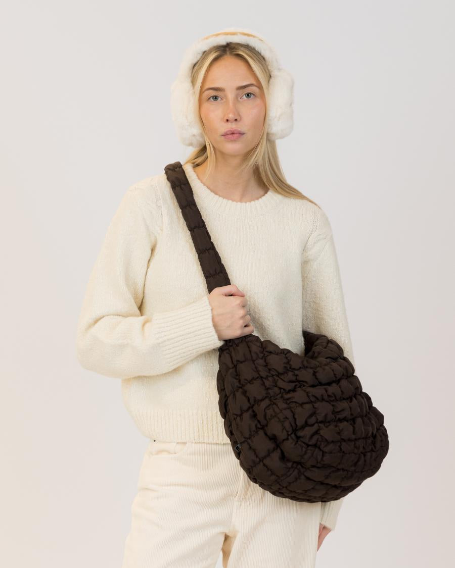 brown quilted bag over the shoulder