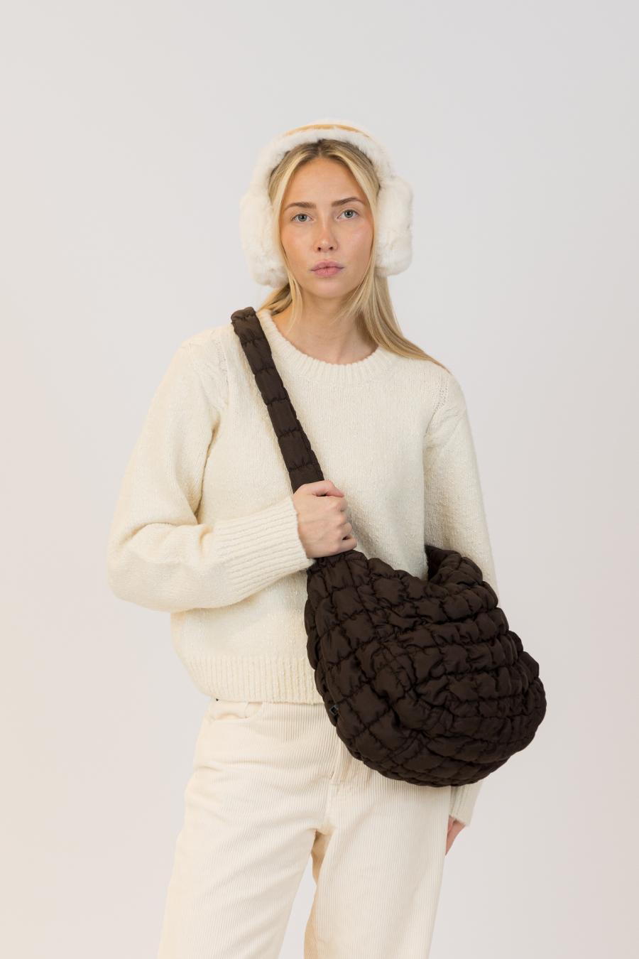 brown quilted bag over the shoulder
