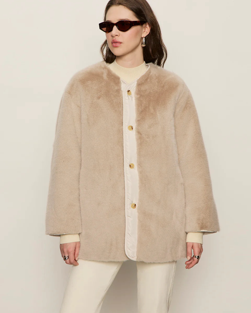 beige coloured fur coat