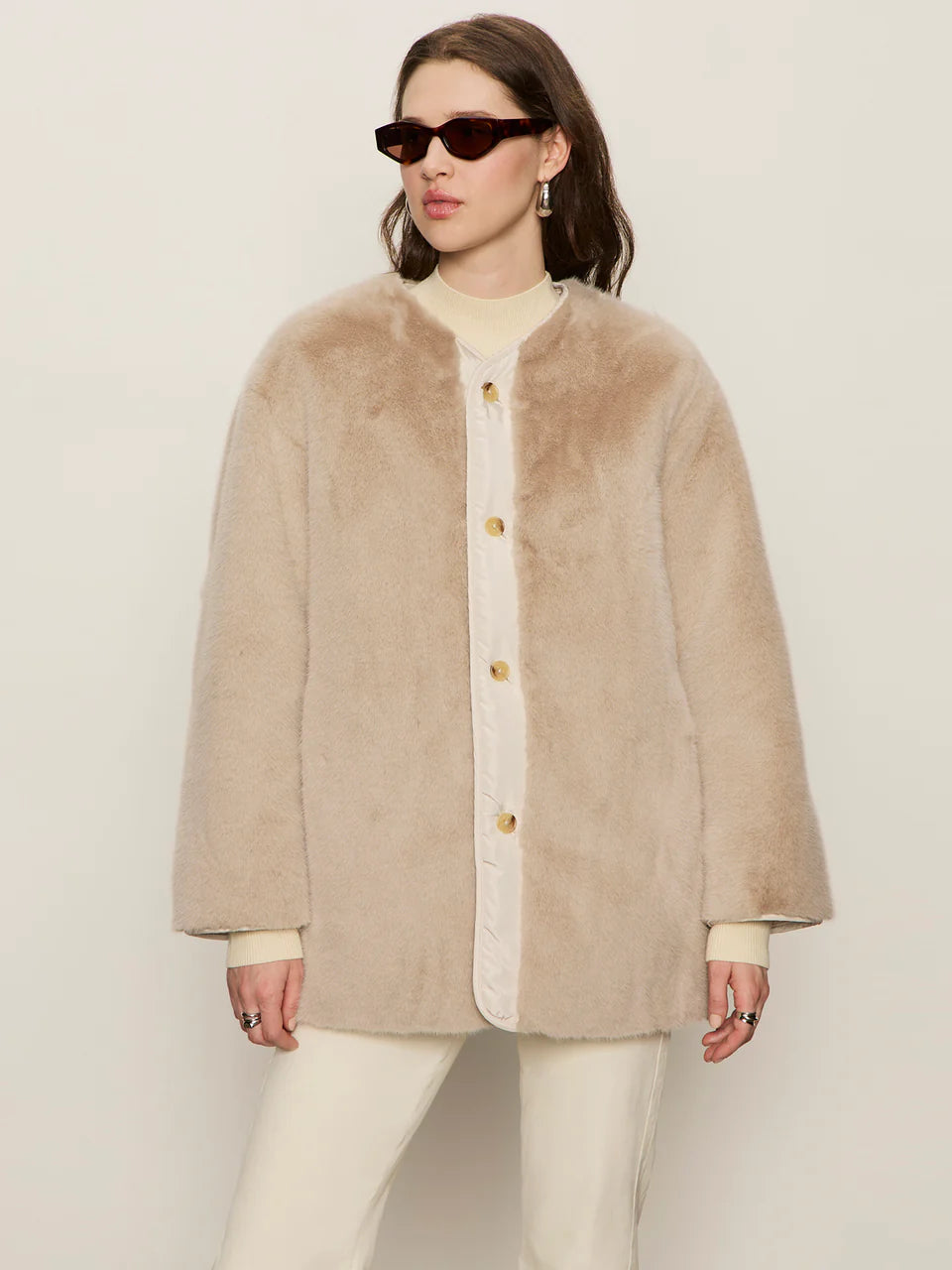beige coloured fur coat