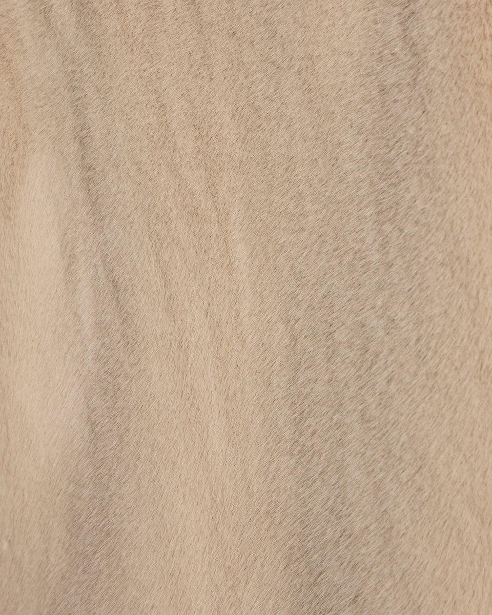 beige coloured fur coat