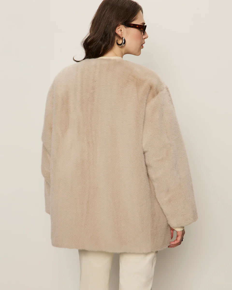 beige coloured fur coat