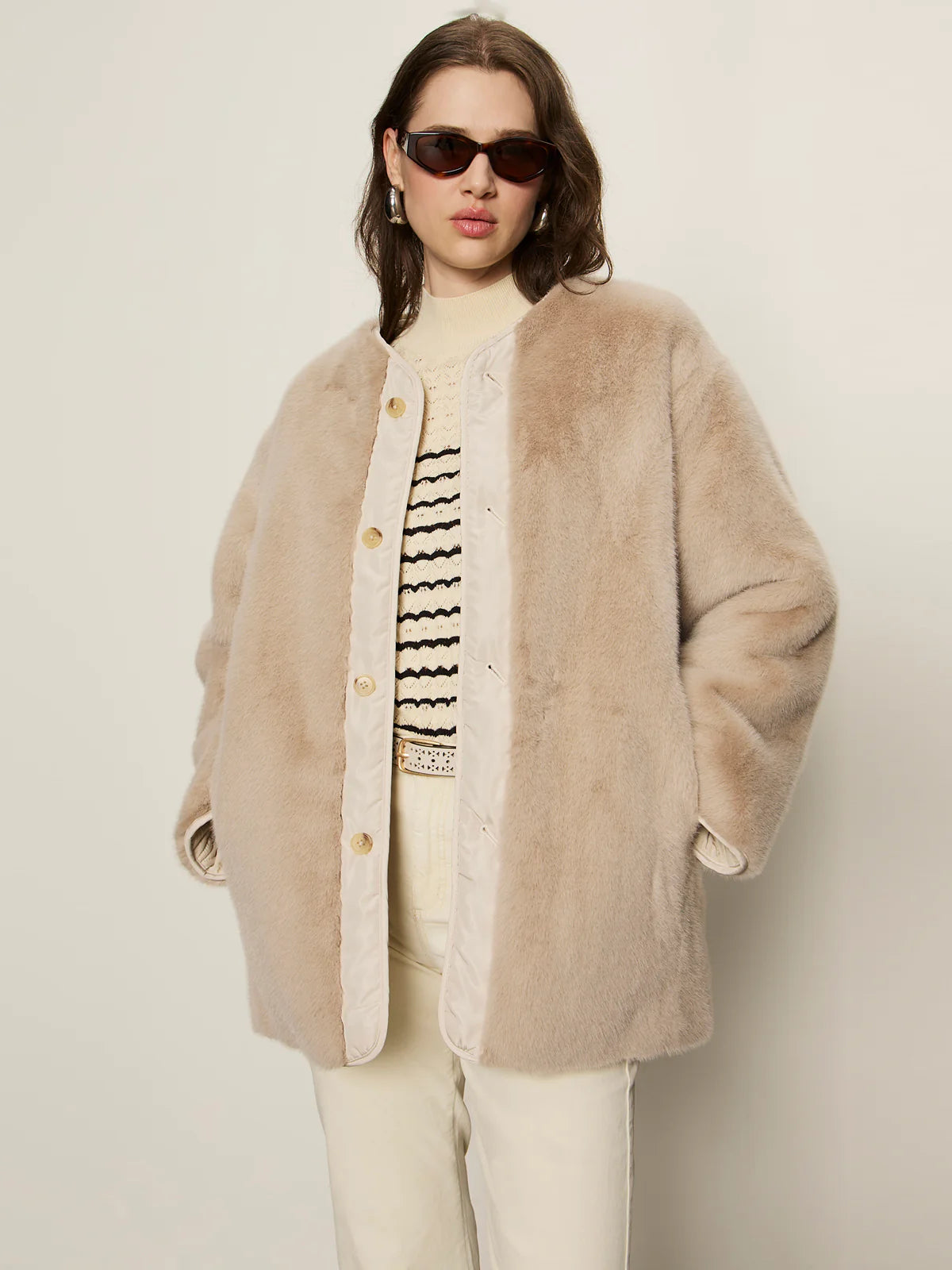 beige coloured fur coat