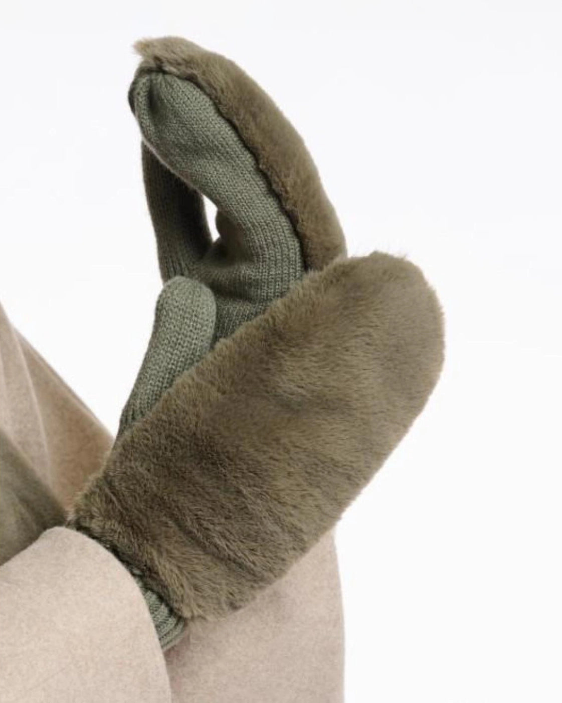 a pair of green faux fur and knit mitten gloves