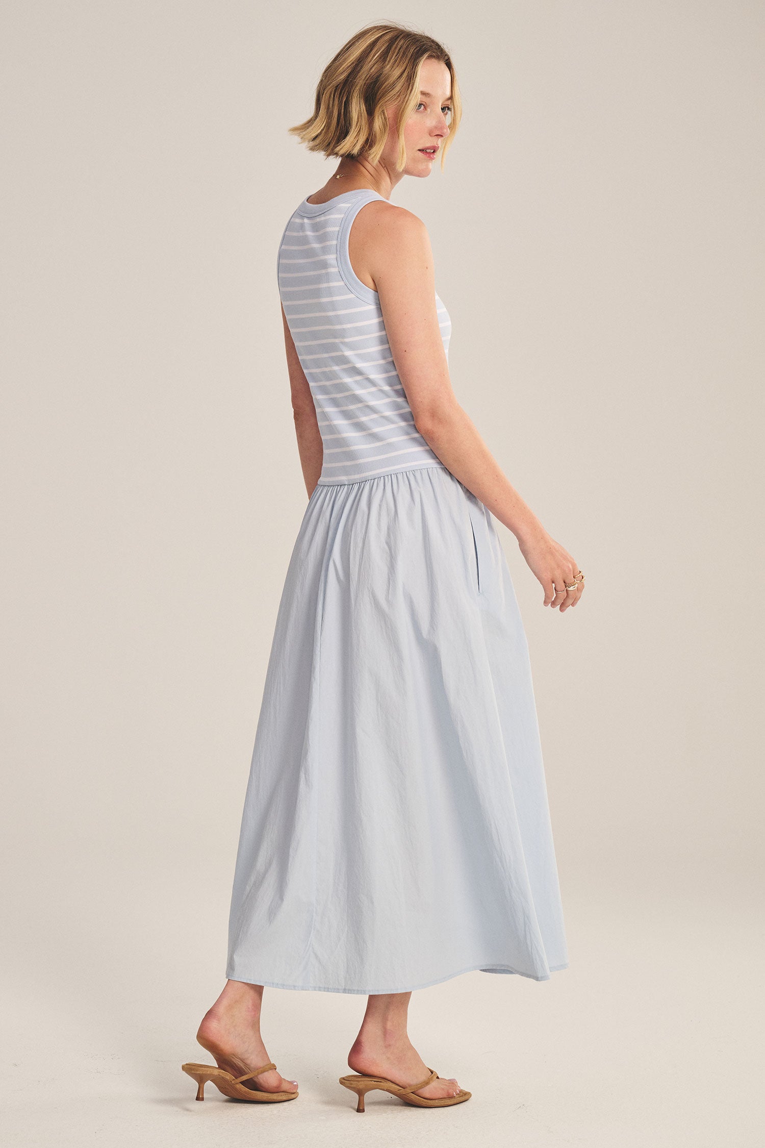 blue midi dress with a striped top and flowy bottom