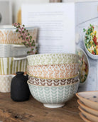 Stack of patterned ceramic bowls
