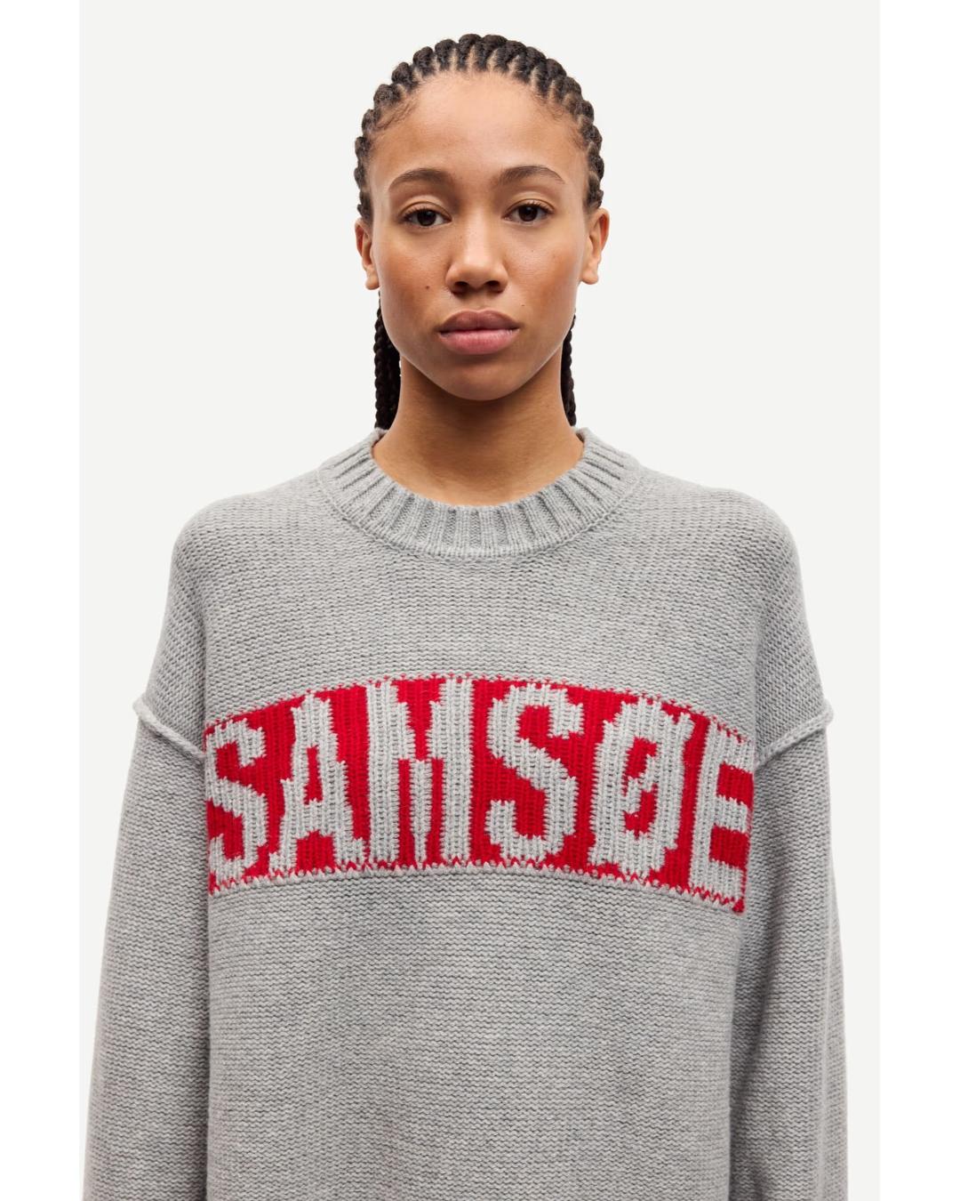 grey knit sweater with samsoe written in red