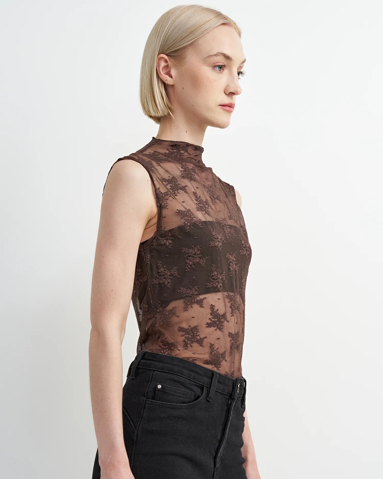 brown sleeveless sheer top with details all over