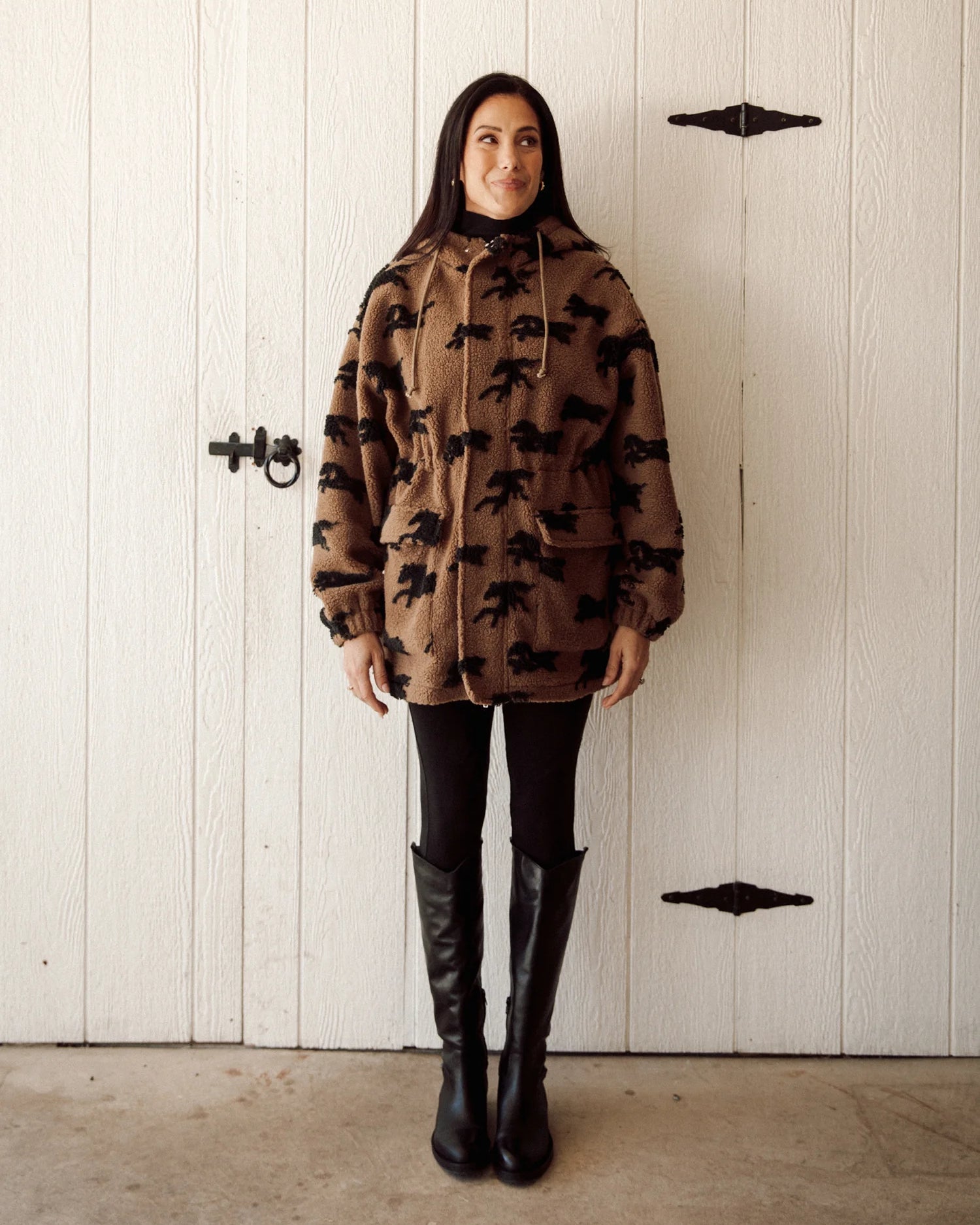 brown parka jacket with brow horses