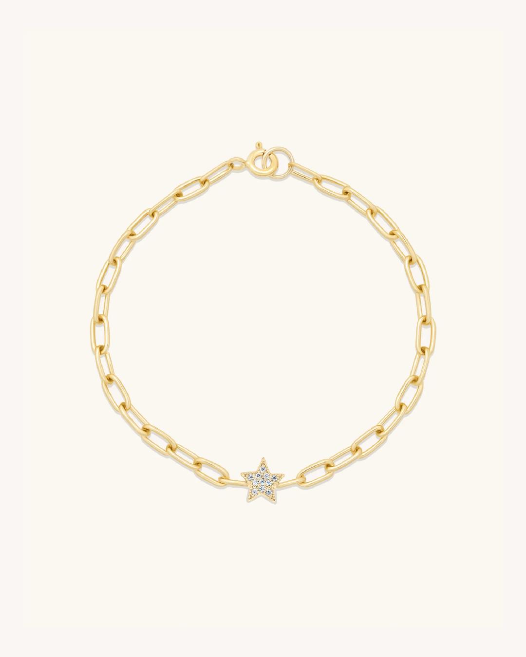 gold chain link bracelet with a star