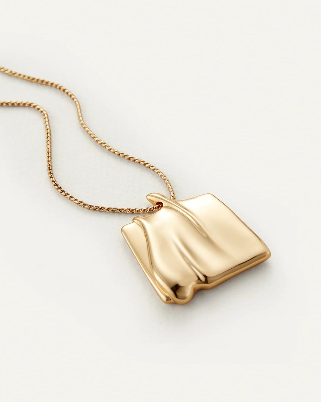 large pendant necklace in gold