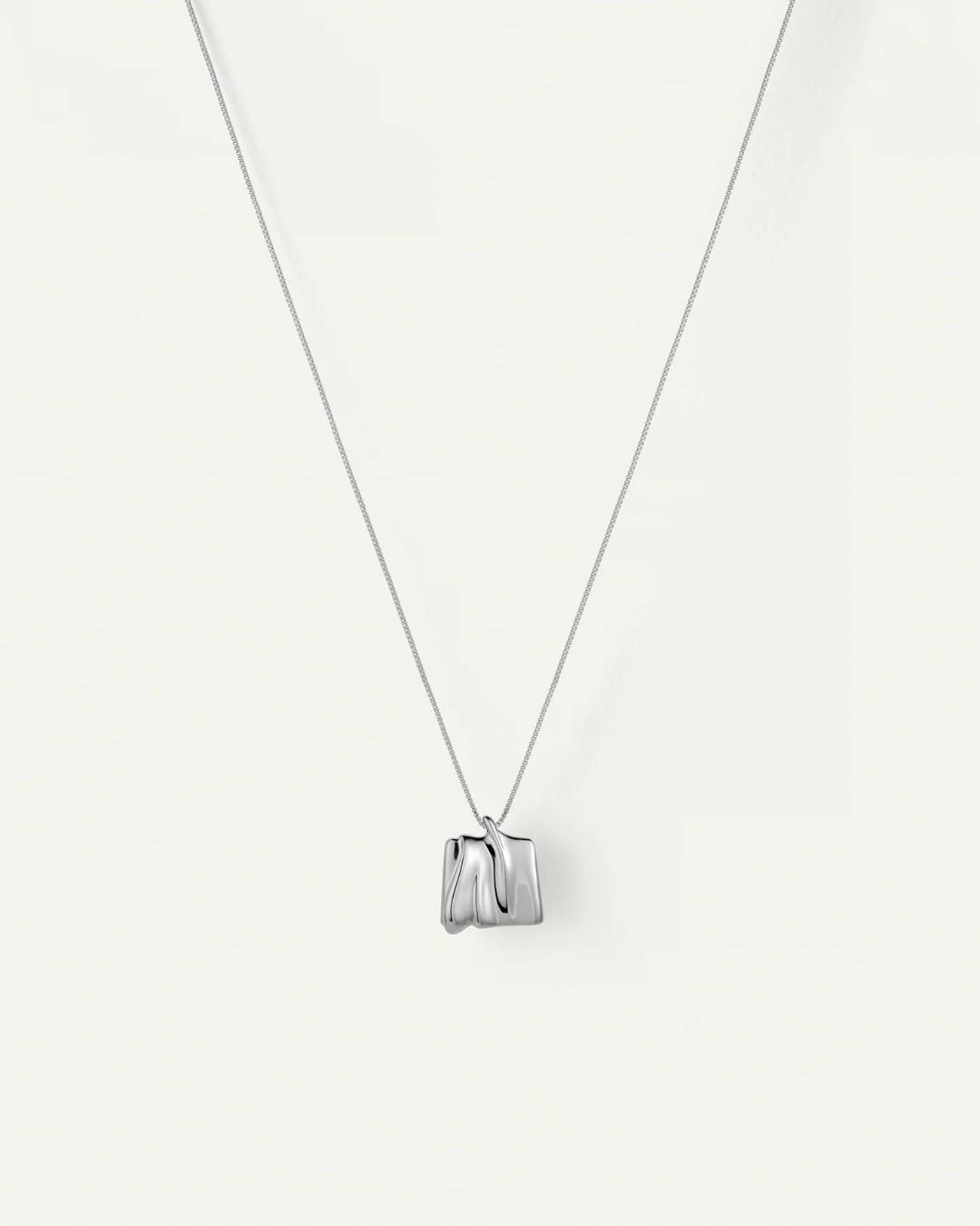 silver necklace with a silver square pendant