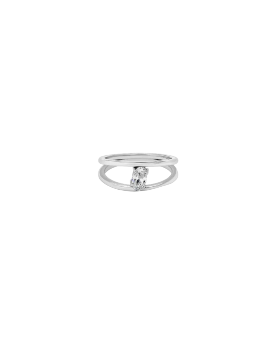 silver ring with gem in the middle