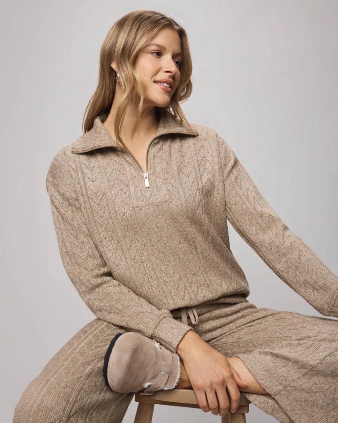 quarter zip sweater in a brown/beige