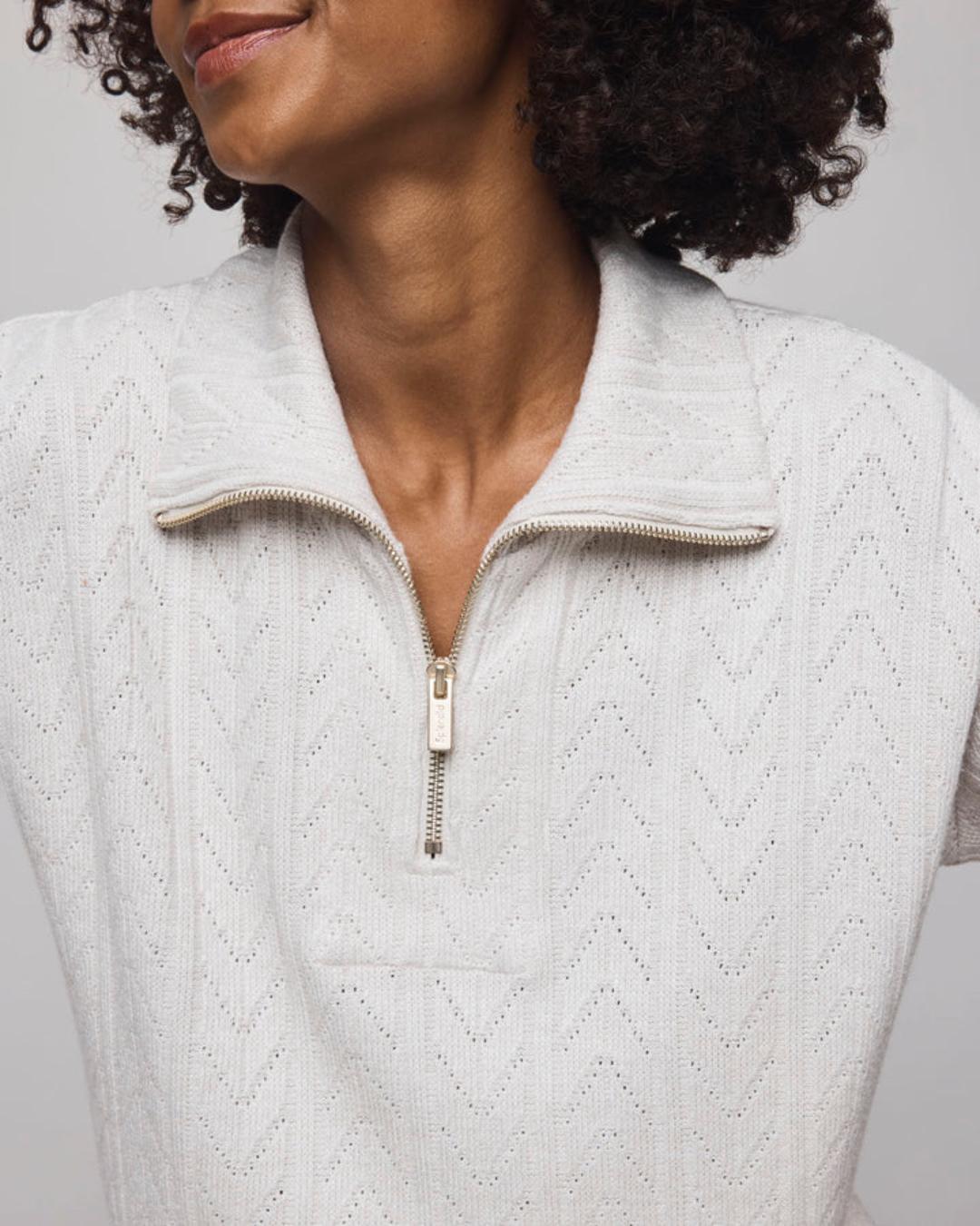quarter zip sweater in a light beige