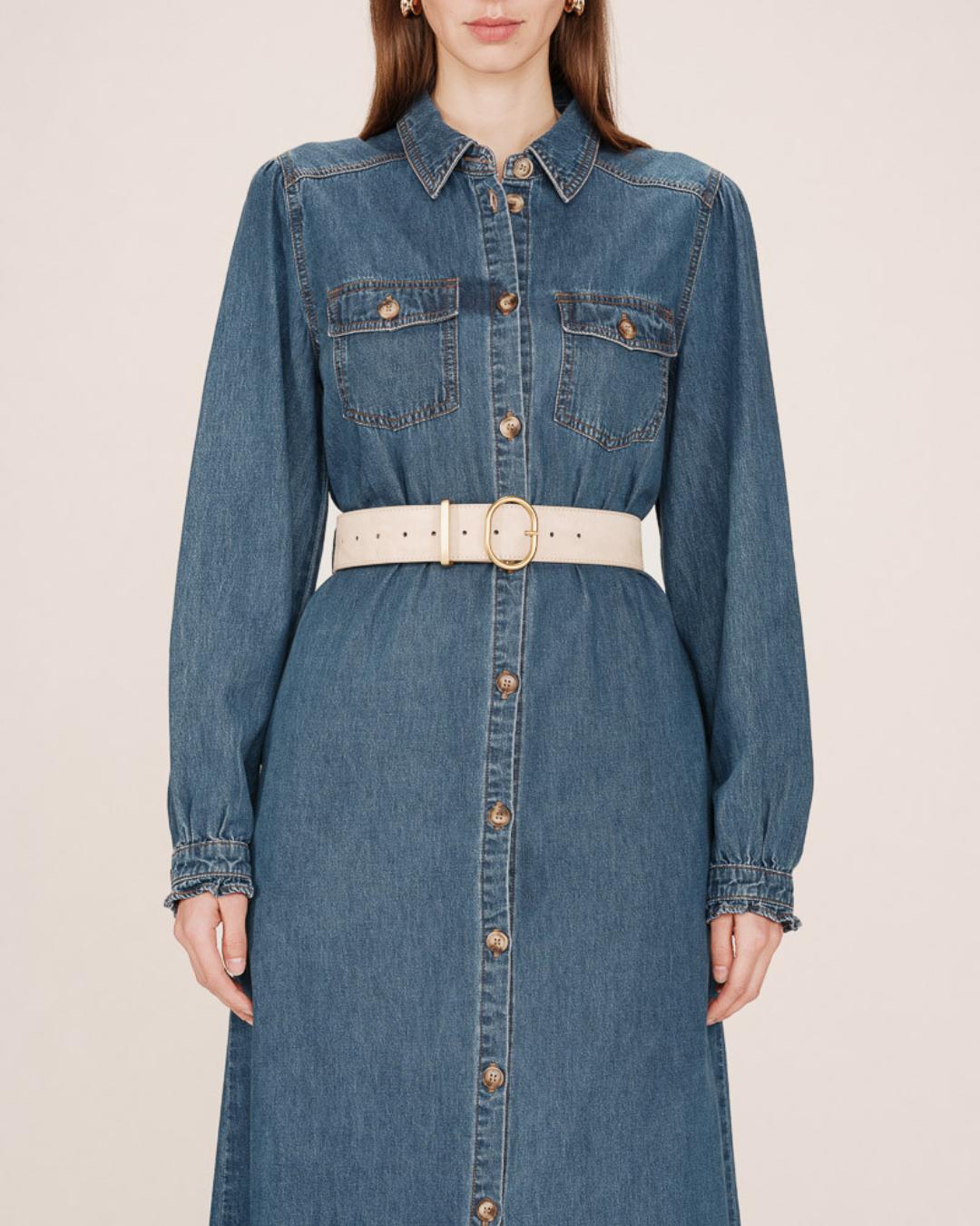 beige belt with gold oval buckle