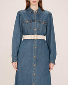 beige belt with gold oval buckle